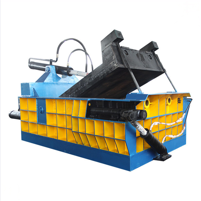 Metal Baler Compacting Iron Shavings on Factory Floor